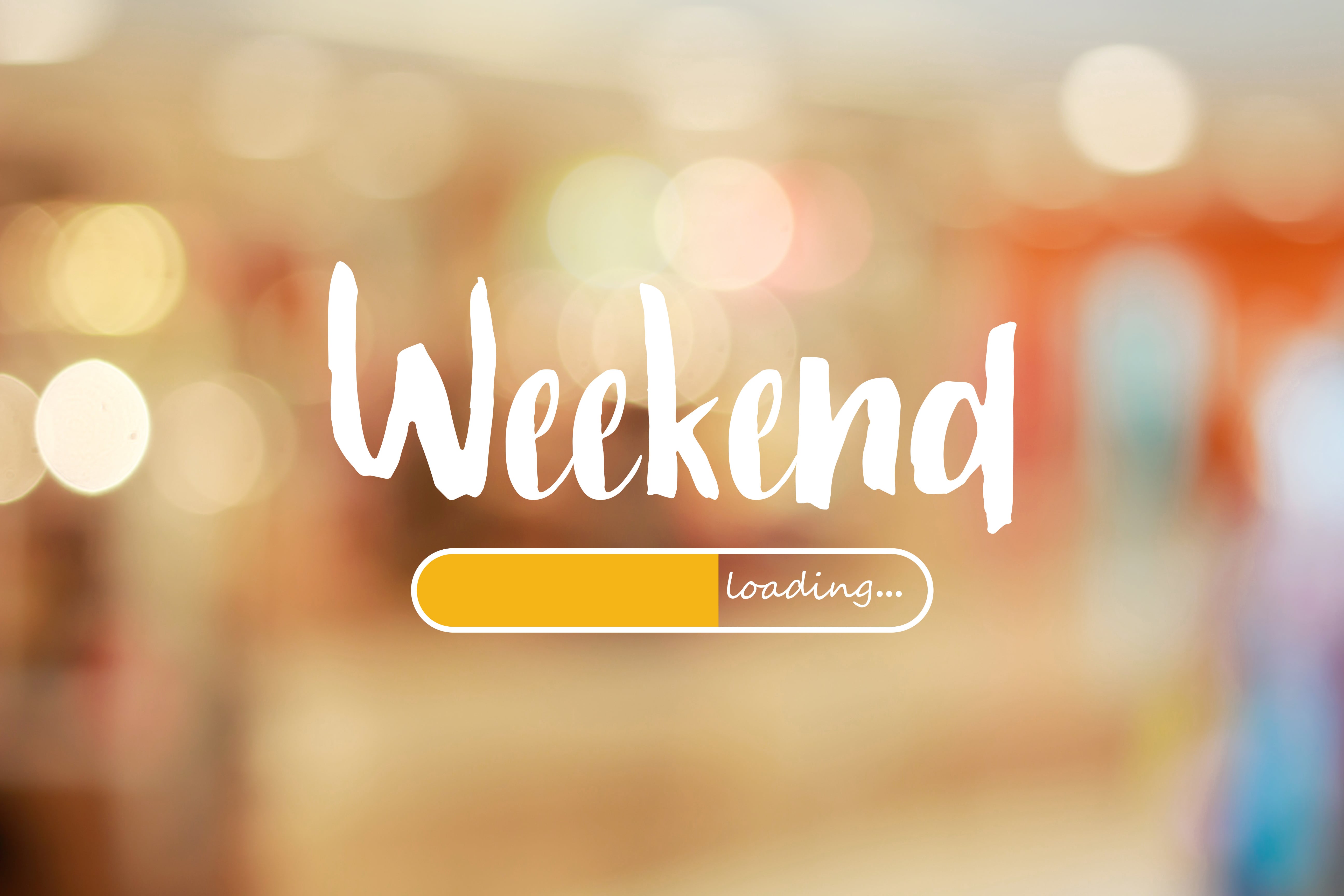 Blurred background with a progress bar and the word 'Weekend' in a handwritten font, symbolizing anticipation for the weekend.